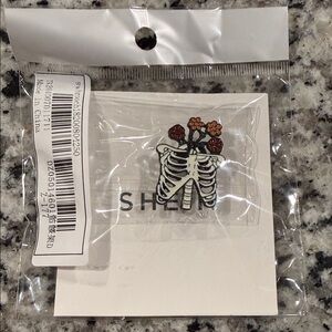 SHEIN Skeleton Ribcage Pin with Floral Accents